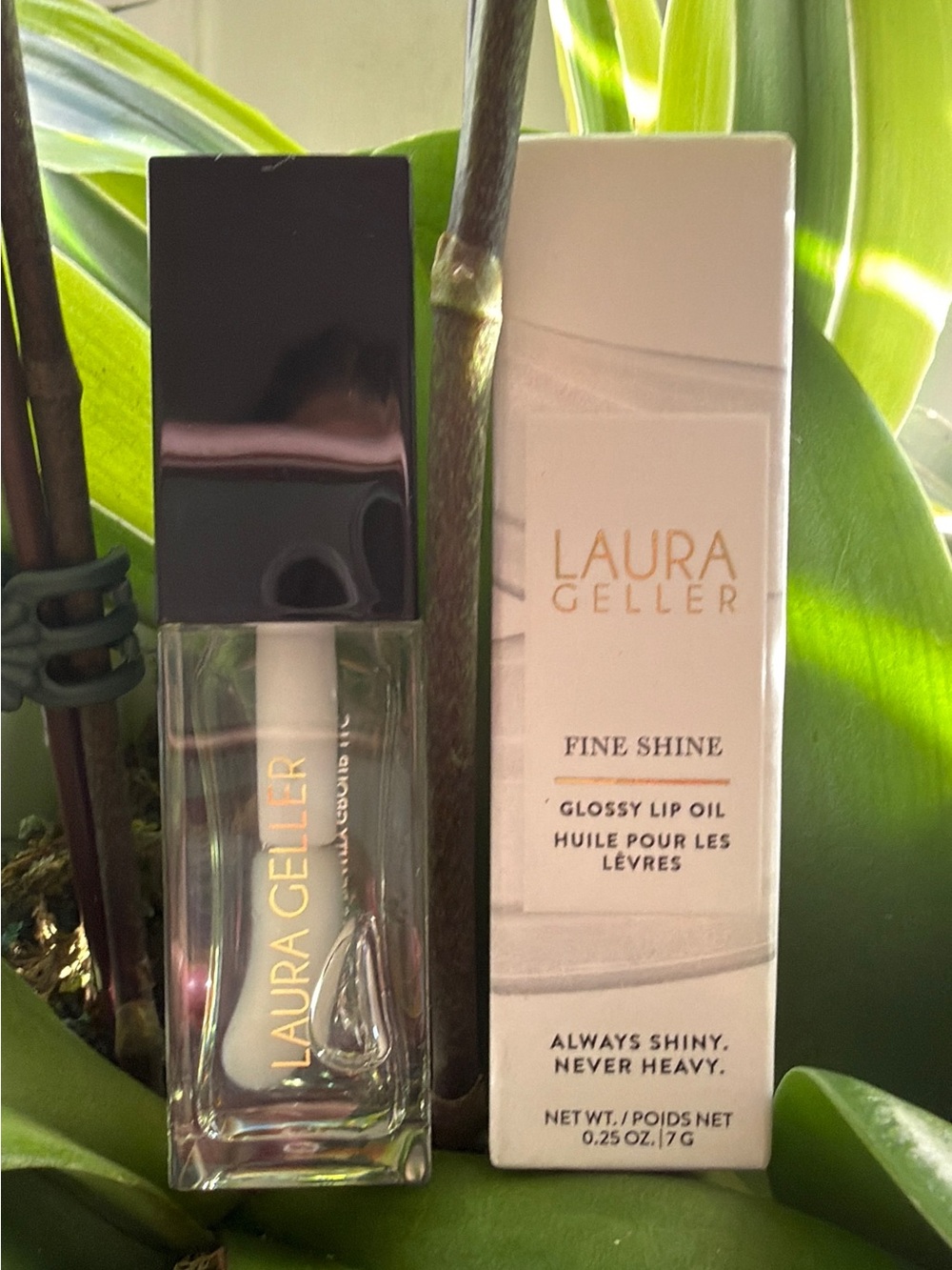 Laura Geller Fine Shine Glossy Lip Oil in Clear/White